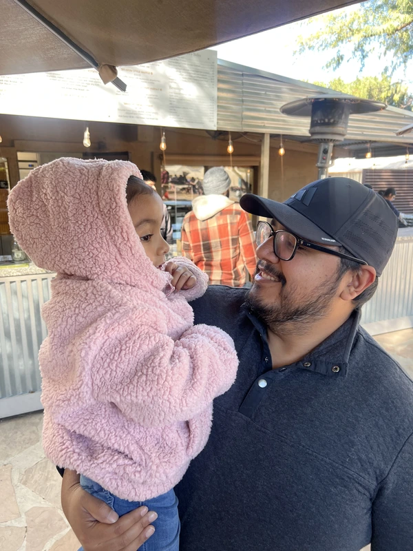 A small smile with a little one